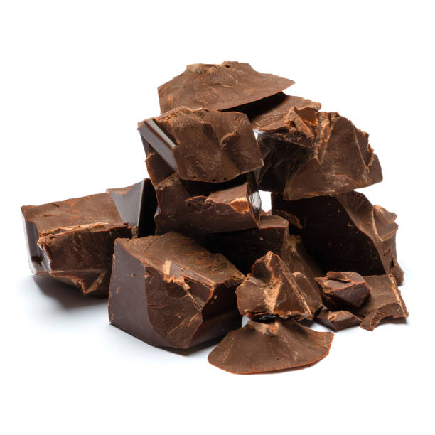 istock Dark or milk organic chocolate pieces isolated on white background 1141625055