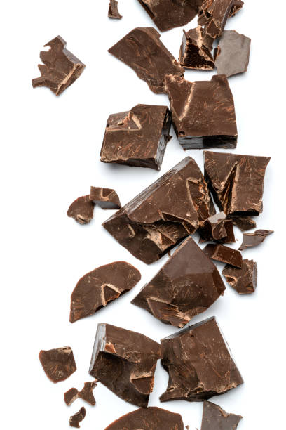 istock Dark or milk organic chocolate pieces isolated on white background 1141625059