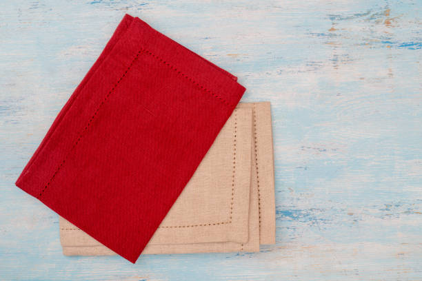 istock Red and white canvas napkins on the table. 1141625663