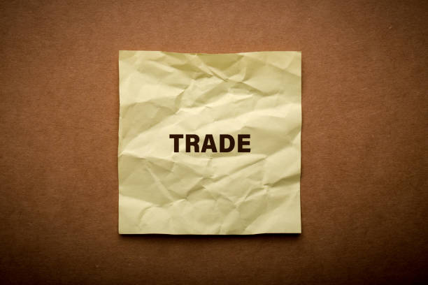 istock Trade on paper with office table. 1141626675