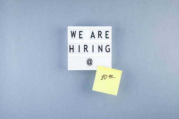 istock We are hiring flat lay on blue background 1141629183