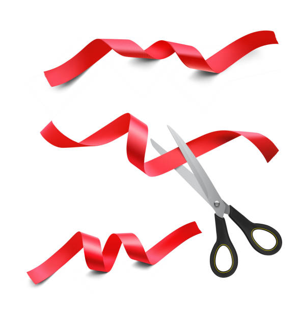 istock Set of red ribbons and scissors on white background. 1141630984
