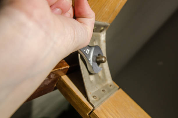 istock repairing the table 1141640753