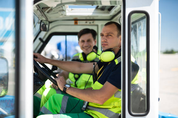 istock Airport workers sitting in the car 1141641154