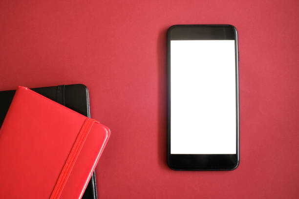 istock Mockup of smart phone on office desk. 1141642625