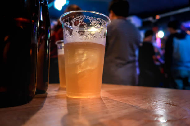 istock Draft beer.  Enjoying Evening Drinks at the pub party in a nightclub . 1141642645