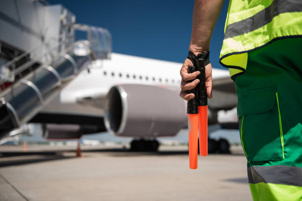 istock Male hand holding signal wands 1141642781