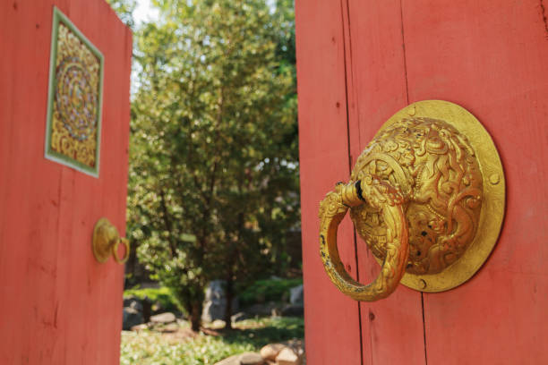 istock The traditional Chinese door with brass door handle. 1141643214