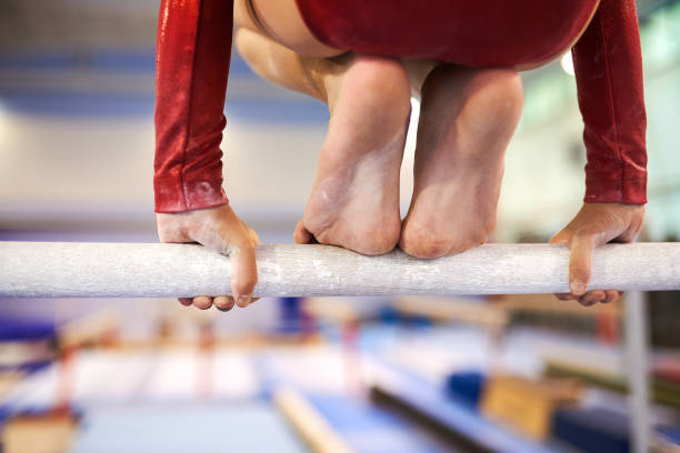 istock Gymnast preparing for acrobatics on a wooden beam. 1141644585