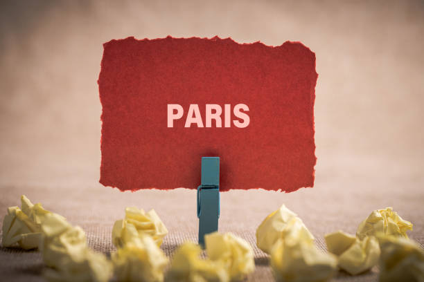 istock Paris word on the paper with office 1141644626