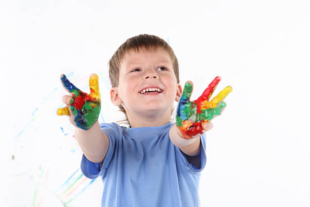 istock little boy draws bright colors 114164506