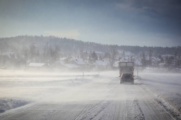 istock A snowy and icy road in the winter. 1141646433