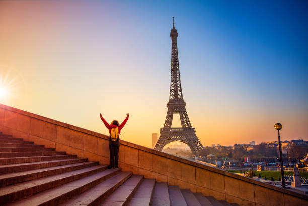 istock Happy tourist exploring Eiffel Tower Paris France 1141646439