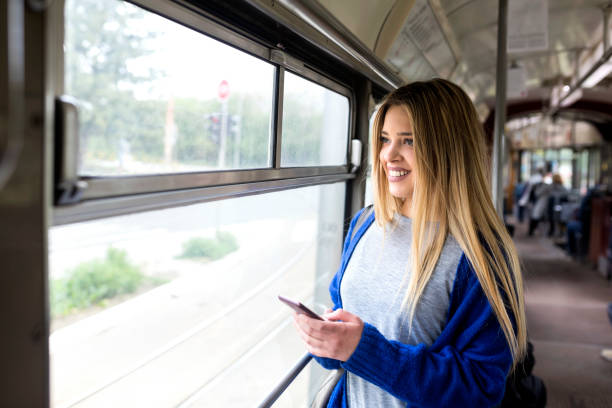 istock Young woman in public transportation 1141646553