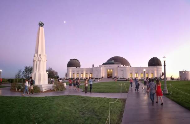 Griffith Park Observatory at dawn, Los Angeles. USA 18 october 2018, Los Angeles - USA: tourists in front of Griffith Observatory at dawn griffith park observatory stock pictures, royalty-free photos & images