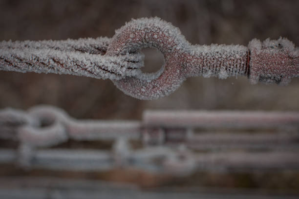 istock Metal rope covered in frost. 1141646648