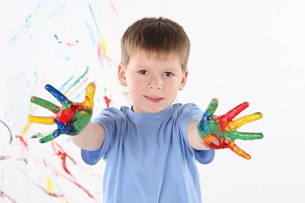 istock little boy draws bright colors 114164752