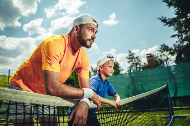 istock Happy male and boy relaxing after pay 1141650726