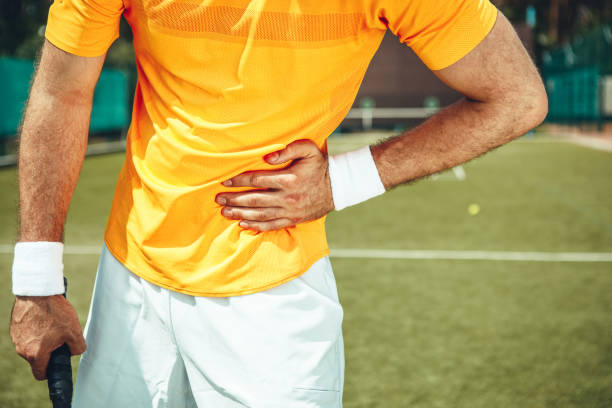istock Man having pain during tennis game 1141650739