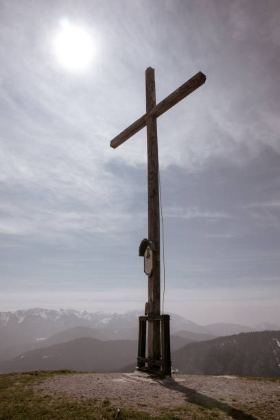 istock Summit cross on mountain Heiglkopf in Bavaria, Germany 1141653156