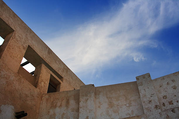 an old wall of fort located in the heritage area in sharjah - UAE