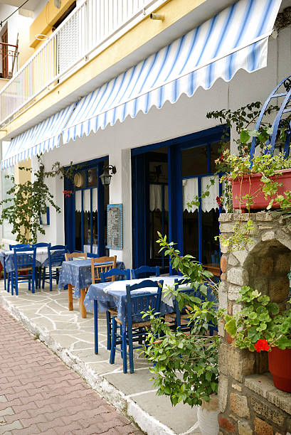 istock Outdoor cafe in greek town 114165648