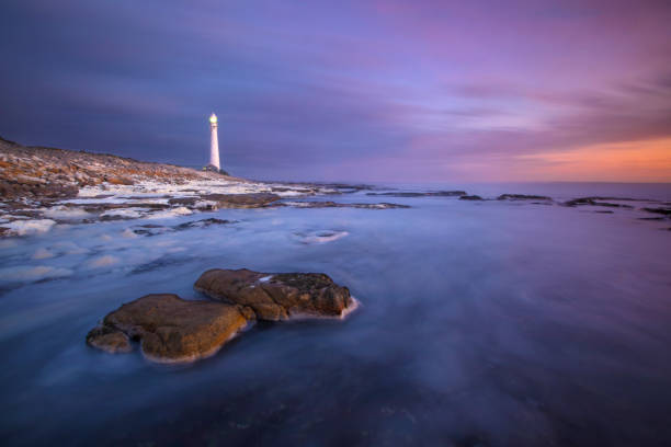 Slangkop Lighthouse, Kommetjie, Cape Town, Western Cape, South Africa. Slangkop Lighthouse, Kommetjie, Cape Town, Western Cape, South Africa. kommetjie stock pictures, royalty-free photos & images