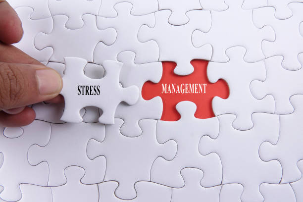 istock Close-Up Of Hand Holding Jigsaw Piece With Text 1141661535