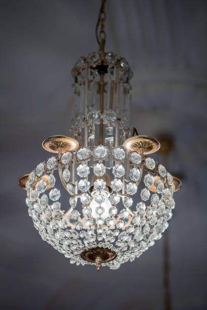 istock Crystal chrystal chandelier hanging from a ceiling 1141666548