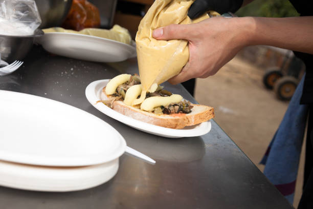 istock Chef preparing toast with meat to takeaway 1141667918