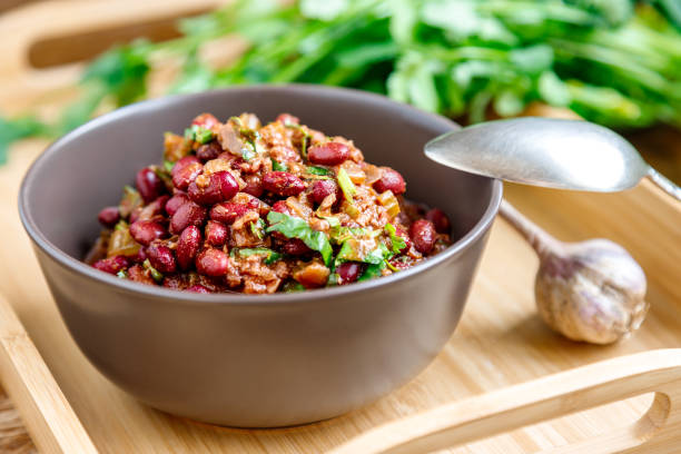 Lobio With Red Beans Lobio with red beans. Traditional Georgian dish of stewed beans and walnuts close-up garlic bulb photos stock pictures, royalty-free photos & images