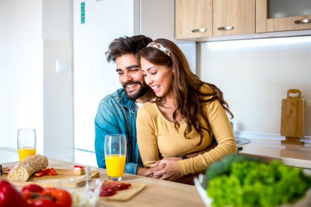 istock Lovely couple in the kitchen 1141671505