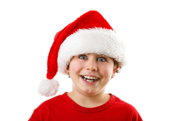 istock Christmas time - boy with Santa Clause hat 1141672473