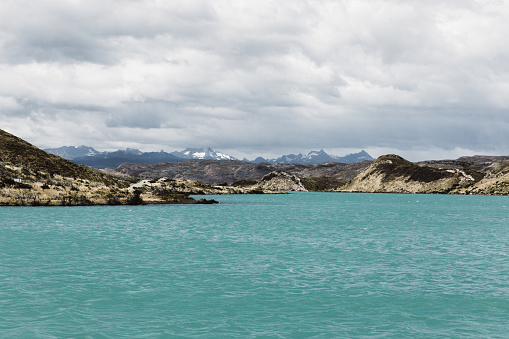 Scenic view of turquoise lake and bright mountains in Chilean Patagonia