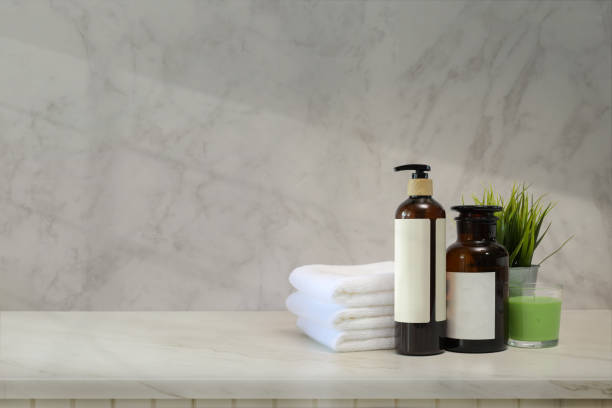 istock Towels and spa accessory on white marble counter table 1141681495