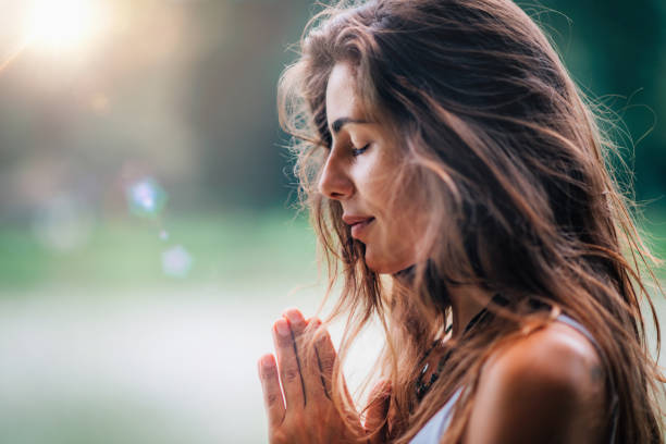 istock Meditating. Close Up Female Hands Prayer 1141683837