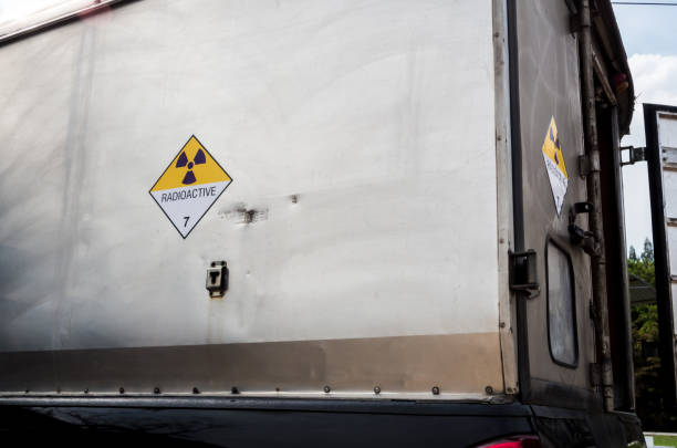 istock Radiation warning sign transport label Class 7 on the Dangerous goods package type A in the container of transport truck 1141685498
