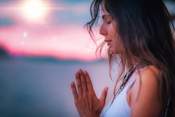 istock Meditating. Close Up Female Hands Prayer 1141685678