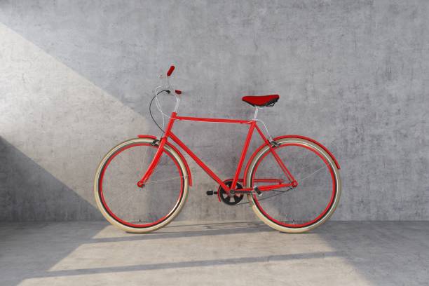 istock red bike on concrete wall 1141686040
