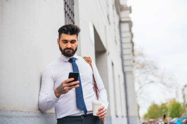 istock Businessman using card at an ATM 1141686952