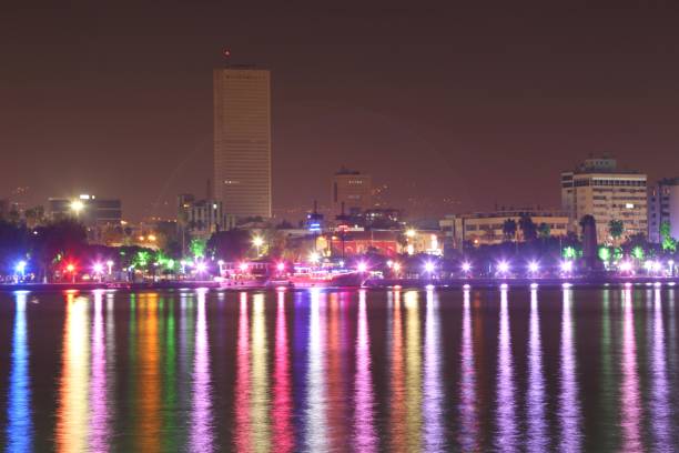 istock city ​​lights and reflection on the sea 1141687139