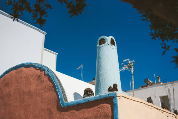 istock White, blue and orange architecture on Santorini island, Greece 1141687213