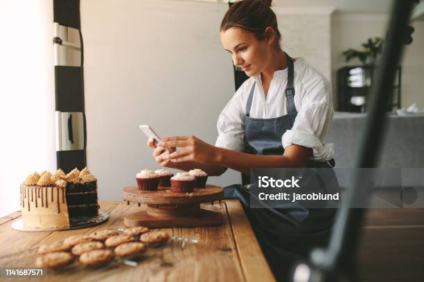 Confectioner Photographing Pastries Stock Photo - Download Image Now - Women, Food, Bakery