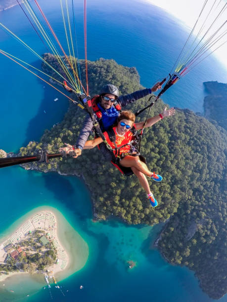 istock Tandem jump in paragliding. 1141688383