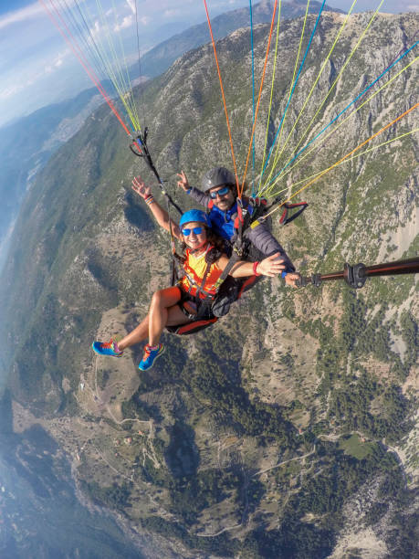 istock Tandem jump in paragliding. 1141688741