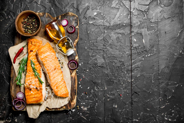 istock Grilled salmon fillet with spices and herbs. 1141689037