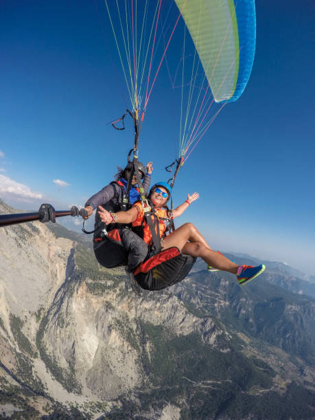 istock Tandem jump in paragliding. 1141690957