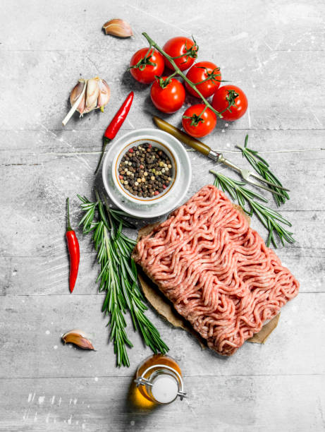istock Raw minced beef with spices and herbs . 1141692170