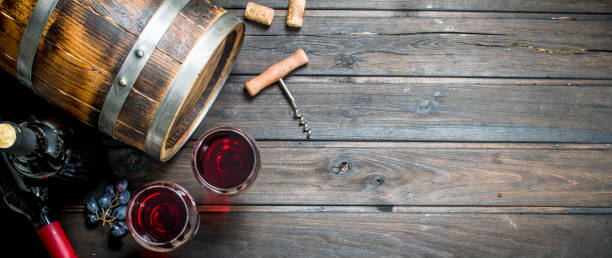 istock Wine background. An old barrel of red wine. 1141692673