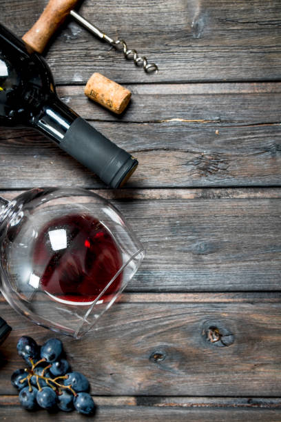istock Wine background. Red wine with grapes. 1141692958